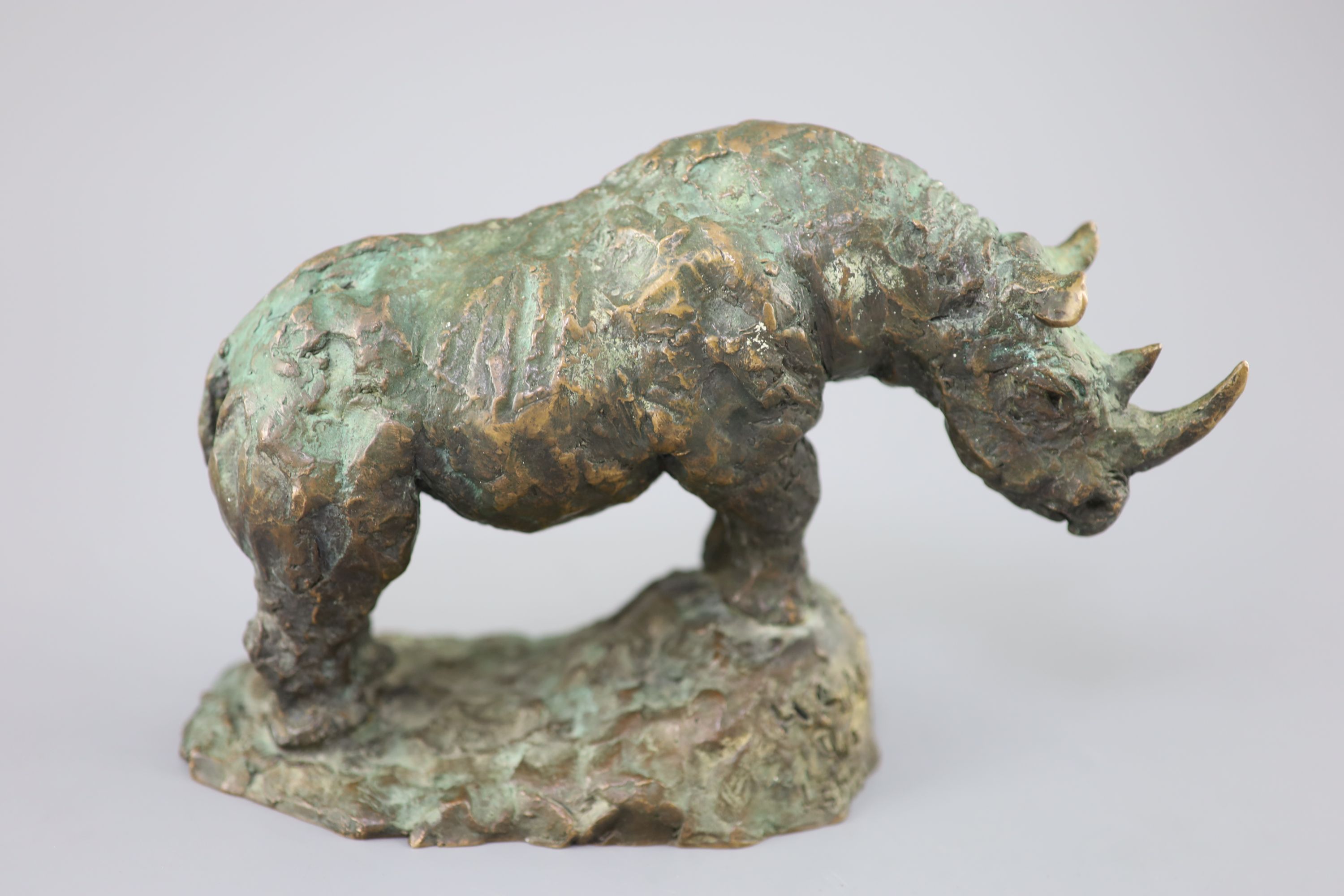 § Hamish Mackie (1973-). A bronze model of a rhinoceros, length 9.5.in. height 6.25in.